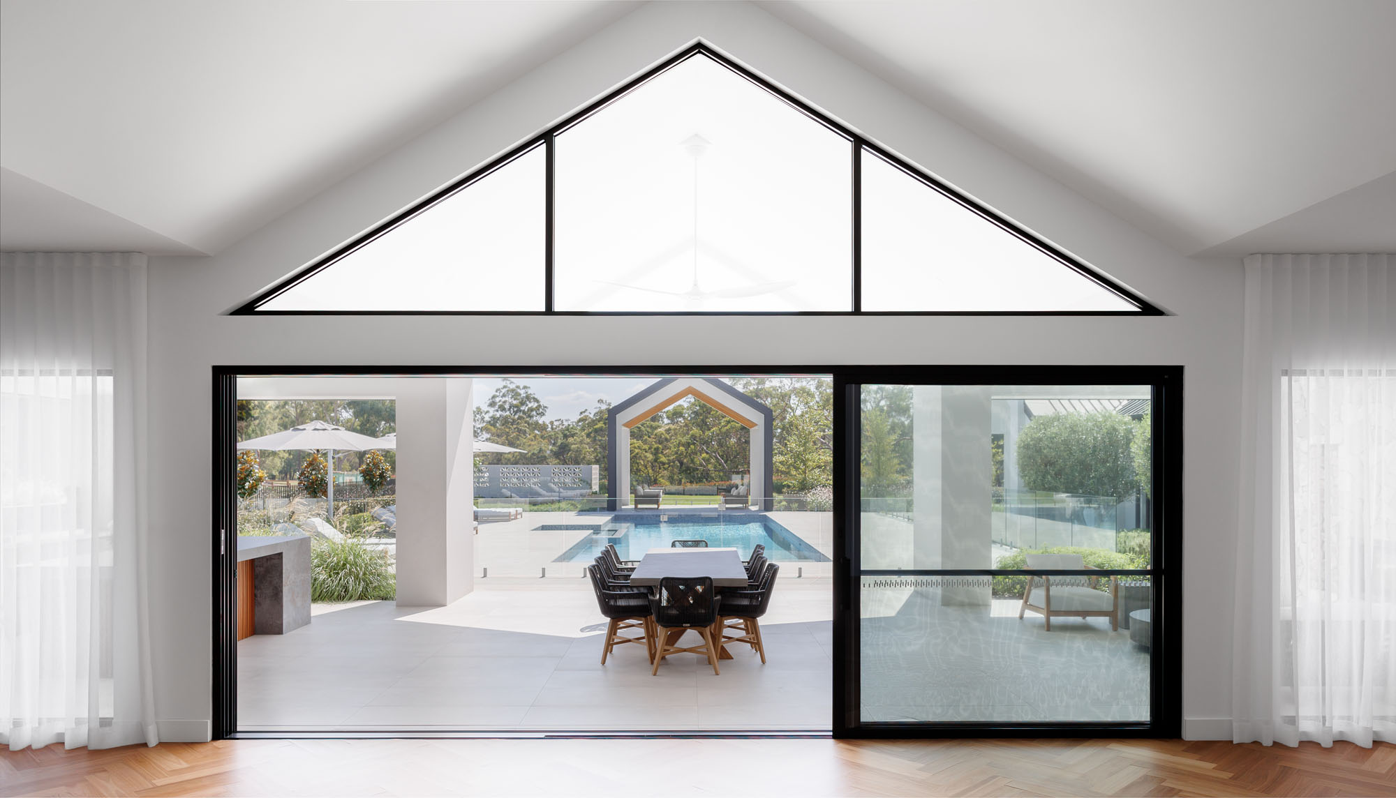 Cunningham Custom Homes_ANNANGROVE_HOUSE_CATHEDRAL_CEILING_LANDSCAPE